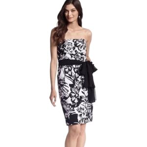 White House Black Market floral sheath dress with pockets and tie. Size 0